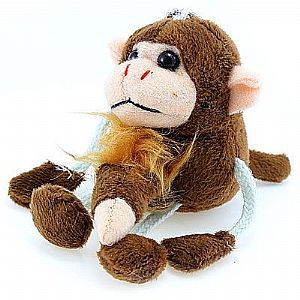 Chaveiro em formato de macaco com pênis a corda